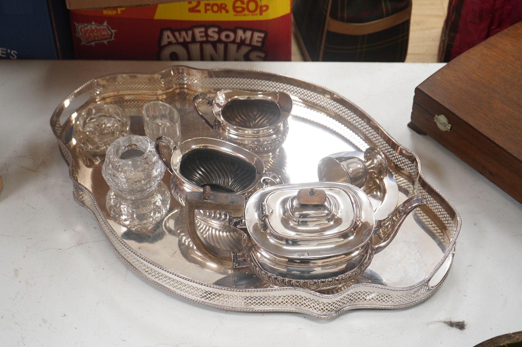 Webber & Hill, an oak cased canteen for six, a shaped galleried tea tray-60cm wide and tea service etc